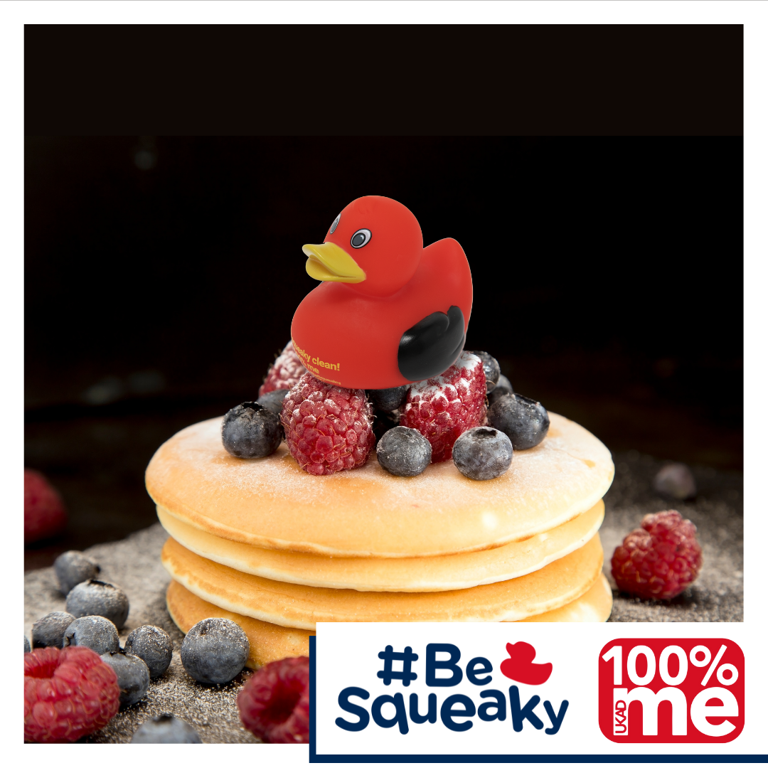 Stack of pancakes with squeaky duck on top and 100% me logo in the bottom corner