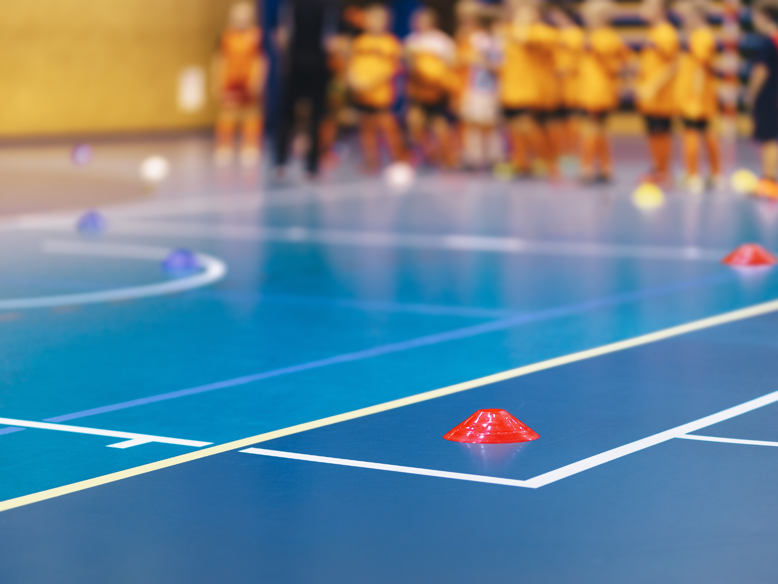 Sports hall with red cones on the floor