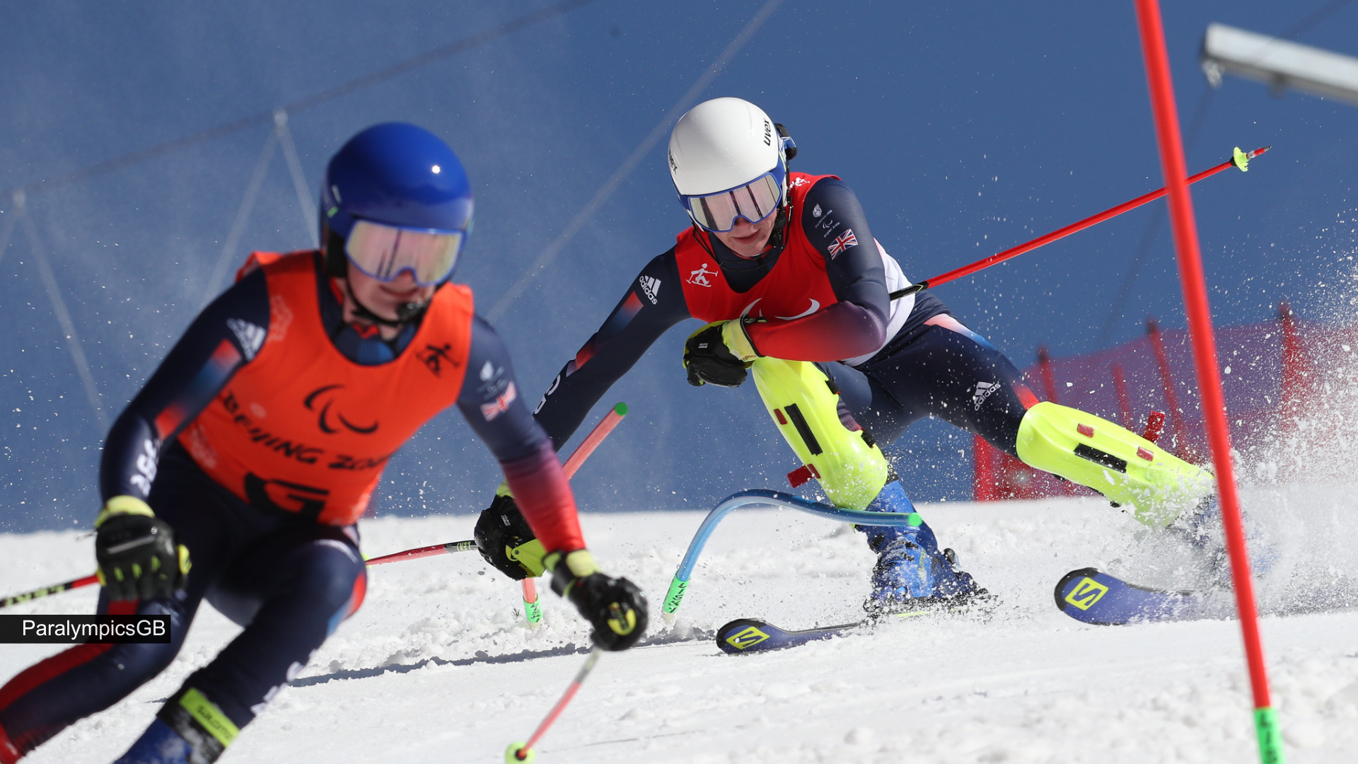 Visually impaired skier and their guide skiing at the Paralympics. Image taken by ParalympicsGB